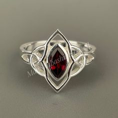 "Natural Garnet Ring, Marquise Red Garnet Ring, Engagement Ring, Dainty Ring, 925 Sterling Silver Ring, Gift For Her, Anniversary Ring Gifts SHOP LINK:- https://www.etsy.com/shop/MaaShabashibaJewell?ref=seller-platform-mcnav 》D E T A I L S《 Gemstone: Natural Garnet                   Gem Color: Red                      Gem Shape: Marquise                        Gem Category: Cut                    Metal: 925 Sterling Silver Purity: 925 Parts Per 1000 Setting Type: Bezel Set Silver Polish: High Ring Size: All Size Available Please note that there Can be slight variations in stone texture and color shades in the actual product that you receive. The stone quality or grade will be the same. Because We Use Natural Stones And All Natural Stones Are Not Of Same Textured. All Our Jewelry Is 925 Sta Red Sterling Silver Birthstone Ring With Open Design, Red Sterling Silver Open Birthstone Ring, Garnet Ring Engagement, Engagement Ring Dainty, Double Rings, Crystal Vibes, January Birthstone Rings, Red Garnet Ring, Ring Marquise