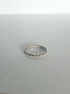 *** Due to Covid-19, Shipping can take longer than usual. DHL is processing packages twice a week. ***925 STERLING SILVER TWIST RING.Delicate handmade .925 sterling silver twist ring. You can wear it on its own or stacked with others.► FEATURES.• Infinity twist ring.• .925 Sterling silver.• Width: 1.8 mm.• Your ring comes in a gift box.NOTE: For special orders in 14k gold (white, yellow, pink), just contact me and i´ll send you the information.► HOW TO ORDER.• Select the size of the ring.• Selec Rope Ring, Rope Rings, Twist Ring, Stacking Ring, Ring Sterling Silver, Stackable Rings, Stacking Rings, Sterling Ring, Sterling Silver Ring