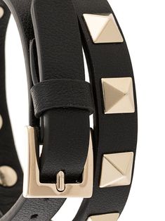 Black calf leather Rockstud double-strap leather bracelet from Valentino featuring gold-tone Rockstud embellishment, gold-plated hardware, double-strap design, buckle fastening, pre-drilled holes and debossed internal logo. | Valentino Garavani Rockstud double-strap leather bracelet Valentino Rockstud, Wrap Around, Valentino Garavani, Calf Leather, Classic Design, Leather Bracelet, Leather Straps, Jewelry Bracelets, Black Leather