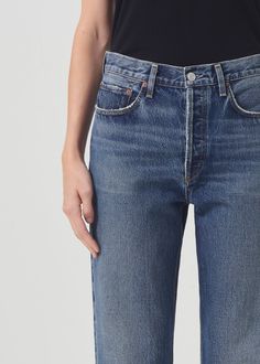 Our best-selling 90's Jean with the much-requested cropped inseam. This decade inspired mid-rise is designed to sit relaxed at the waist with an easy fit through the hips into a classic, loose straight leg. Style back to anything and everything. Crafted in our signature Organic Cotton, this pair will only get softer with each wear. For the full-length version, shop the 90's Jeans. This fit is intended to be relaxed. Size down for a higher, closer fit. Looks Like: Lived-in deep medium indigo with 90s Jeans, Product Development, Stretch Cotton, Mid Rise, Full Length, Straight Leg, Organic Cotton, How To Wear