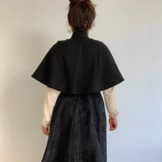 This wonderful textile is an antique French capelet, dating to the late 1800s. The black material is a beautiful textured silk blend fabric. This textile would have been worn about the shoulders as a stylish accent. It fastens at the neck with 2 metal hook and eye clasps. The collar is lined with a heave linen to keep it stiff, you can see it becuase the black fabric has come loose at the back of the neck. The rest of the cape is not lined, but the simple seams are reinforced with a kind of nett Black Capelet For Costume, Fitted Black Capelet, Black Fitted Capelet, Elegant Black Capelet For Costume, Formal Black Capelet, Elegant Black Formal Capelet, Victorian Capelet, Lace Apron, Shoulder Cape