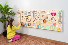 "This set of sensory wall panels was made in a forest or park theme. Pastel colors will softly complement the design of the play area in Children's Museums, Science Centers, libraries, schools, hospitals, etc. The wall busy board features a range of tactile, sensory, and manipulative components that encourage children to explore, discover, and learn through play. This activity panel set includes:     Sliders, that slide along a track     Shape and color logical sorter - children are given objects of corresponding colors and shapes to place in the matching slots.     Abacus element to develop count ability and fine motor skills and hand-eye coordination.     Rotating wheels, gears, that children can turn to create movement and observe cause-and-effect relationships.     Intricate paths  wit Kids Waiting Room, Kids Ministry Design, Cowork Space, Theme Pastel, Pediatric Dental Office, Tactile Sensory, Play Cafe, Science Centers, Colors For Kids