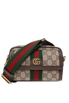 Find GUCCI Ophidia Gg Mini Crossbody Bag on Editorialist. This Gucci Ophidia GG Mini Crossbody Bag is crafted from canvas and features a green and red web stripe detail and a gold-tone GG logo. It has an adjustable strap that can be worn on the shoulder or crossbody. It measures 20cm wide, 12cm high, and 9cm deep. It is made in Italy.