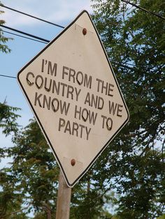 a sign that says i'm from the country and we know how to party