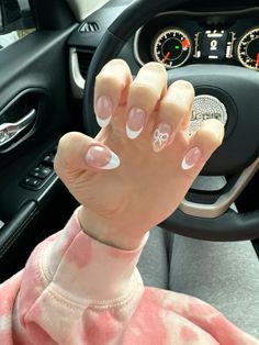 acrylic nails | almond | french tip | christmas | coquette | pink bow Croquette Nails Almond, Almond French Tip With Design, White French Tip With Pink Bow, Bow Nails Christmas, French Tip Bow Nails, White French Tip With Bow, Pink Christmas Nails Short, White Bow Nails, Christmas Pink Nails