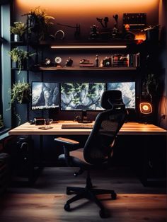 a desk with a chair and two monitors in the corner, all lit up at night