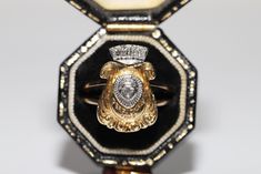 VINTAGE ORIGINAL 18K GOLD NATURAL DIAMOND DECORATED FACE DESIGN WRITTEN RING In very good condition. Total weight is 5.4 grams. Totally is diamond about 0.15 carat. The diamond is has G-H color and vs-vvs-s1 clarity. Ring size is US 5.7 We can make any size. Please contact for any questions. Antique Diamond Ring With Vvs Clarity, Victorian Diamond Ring With Vvs Clarity, Antique Signet Ring With Diamond Accents For Formal, Antique Signet Ring With Diamond Accents For Formal Occasions, Vintage Formal Signet Ring With Diamond Accents, Vintage Signet Ring With Diamond Accents For Formal Events, Vintage Signet Ring With Diamond Accents For Formal Occasions, Collectible 14k Gold Diamond Ring With Rose Cut Diamonds, Classic Diamond Signet Ring Collectible