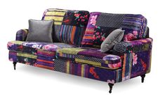 a multicolored couch with pillows on it