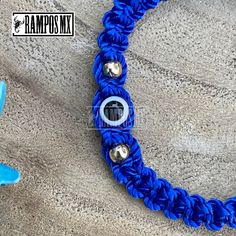 "Beautiful Mexican Handmade Woven \" Blue Evil Eye Symbol\" Unisex bracelet \"Mal de Ojo\" with the company of San Benito Symbol is Handmade braided Design by our Artisan Team to create a beautiful Stylish ,protection and positive accessory , definitely a must have in your religios Collection :) ( One bracelet per order) Color can change slightly depending on the device screen thats been viewed on. Bracelet has and adjustable : One size Fits All Unisex Brazalete Pulcera Tejida a Mano por Artesan Blue Macrame Bracelets For Festival, Blue Macrame Beaded Bracelets For Festival, Blue Macrame Friendship Bracelets For Festival, Blue Macrame Beaded Bracelets As A Gift, Blue Adjustable Bangle Bracelet, Blue Braided Bangle Bracelets As Gift, Blue Braided Bangle Bracelet As Gift, Blue Resizable Bangle Bracelet, Blue Adjustable Evil Eye Bracelet For Friendship