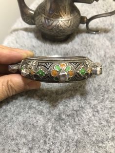 Antique Berber silver enamel bracelet from region Tafraout southern of Morocco. Dimensions: Inner diameter:5,6cm Width :2cm Weight : 92,2g African Bracelets, Moroccan Jewelry, Silver Heart Ring, Enamel Bracelet, Silver Enamel, Silver Coins, Silver Heart, Photo Jewelry, Handmade Ring