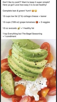 a white plate topped with sliced avocado and tomatoes