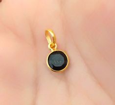 Natural Black Onyx Charm 18k Yellow Gold Pendant , Handmade Jewelry , Dainty Pendent  Material Metal = 18k Gold Gemstone = Black Onyx Main Stone Color = Black Main Stone Size = 6x6 MM Stone Creation = Natural Total Charm weight =0.400 grams Pendant loop Size = 4.5 mm Inside Pendant Total Length =15 MM (Include Ball ) Product Making = Handmade Thank You Visiting My Shop. Black Onyx Benefits ? In addition to its emotional benefits, Black Onyx is believed to possess various physical healing propert 22k Gold Bezel Setting Jewelry Gift, 22k Gold Jewelry With Bezel Setting Gift, Black Hallmarked Round Pendant Jewelry, Black 22k Gold Jewelry As A Gift, Black 22k Gold Jewelry Gift, Physical Healing, Jewelry Dainty, Yellow Gold Pendants, Black Onyx