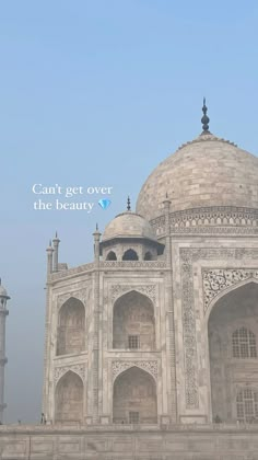 the tajwa mosque in india is surrounded by tall white pillars and arches with an inscription that reads, can't get over the beauty