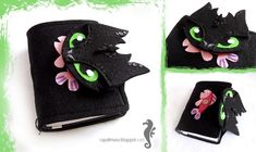 the book is made to look like a cat with green eyes and pink flowers on it