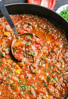 a ladle full of soup is being held by a spoon with the words rice urles to stir it up