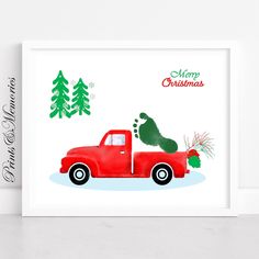 a red truck with a christmas tree on the bed and a bear in the back