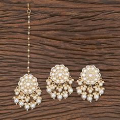 Whether you are the bride or sassy bridesmaid, no lehenga is complete without a maang tikka set. The maang tikka set is perfect to steal the show with its glitter and texture. The meticulous attention paid to the craftsmanship makes it an epitome of jewelry inspiration. Height = 53 mm || Width = 43 mm Trendy Design Indo Western Earring 100% Satisfaction Guarantee: Long Lasting Plating, High-Quality Stones. Gifting: This pair of charming earrings and maang tikka set come in a beautiful gift box, Kundan Studs, Jewelry Indian Wedding, Maang Tikka Set, Indian Nose Ring, Usa Jewelry, Western Earrings, Maang Tikka, Bollywood Jewelry, Pakistani Jewelry