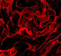 an abstract red and black background that looks like liquid or paint with streaks on it