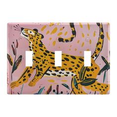 a light switch cover with an image of a leopard