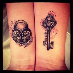 two tattoos on their arms with key and lock in the shape of hearts, one is for each other