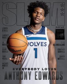 a man holding a basketball on top of a magazine cover with gold lettering and an image of the player