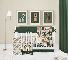 a baby's room with green curtains and pictures on the wall, including a giraffe crib