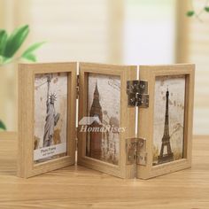 an open wooden frame with pictures of the eiffel tower