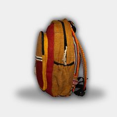 A hemp backpack ethically hand-crafted in Kathmandu, Nepal. Bohemian Backpack In Natural Color For Everyday Use, Bohemian Style Natural Color Backpack For Everyday Use, Traditional Handmade Rectangular Backpack, Handmade Natural Backpack For Everyday Use, Bohemian Natural Color Backpack, Traditional Rectangular Backpack For Travel, Traditional Travel Backpack, Casual Woven Standard Backpack, Eco-friendly Brown Backpack For Travel