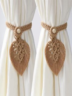 curtains with tassels and buttons on them