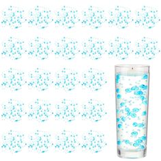 a tall glass filled with blue bubbles next to a white background that has small dots in it