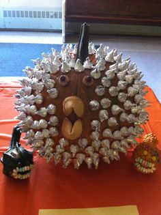 a hedgehog made out of candy on top of a table