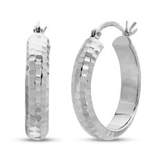 A lustrous hammered round hoop forms these timeless women's hoop earrings. Crafted in versatile 14K white gold, the 21mm earrings secure with hinged backs. Modern Hammered Hoop Earrings For Formal Events, Modern Hammered Hoop Earrings For Formal Occasions, Modern Round Diamond-cut Huggie Earrings, Modern Round Diamond Cut Huggie Earrings, Small Hammered Hoop Earrings For Formal Occasions, Hammered White Gold Earrings For Anniversary, White Gold Hammered Earrings For Anniversary, Anniversary Hammered Hoop Earrings, Anniversary White Gold Hammered Earrings