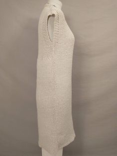 "Beautiful handmade thick sweater dress - jumper - long tunic vest. Very versatile and many different looks attainable. No labels, yarn feels like a super high quality acrylic. Has the Aran wool cream coloration, a natural & neutral color. Great workmanship and stitch work. Very strechy. Measurements flat unstretched. Condition excellent, no stains, damage, wear, or issues. Length 39\" Shoulder 19\" Pit to pit 18\" (36\" stretch to 52\") Waist 39\" Hips 40\" Hem circumference 46' Wt 1.6lb 2 Casual Sleeveless Knitted Sweater Dress, Sleeveless Knitted Sweater Dress For Fall, Fitted Sleeveless Knitted Sweater Dress, Sleeveless Knit Sweater Dress For Winter, Fitted Chunky Knit Sweater Vest, Fitted Cream Knit Sweater Vest, Cozy Fitted Knitted Sweater Vest, Fitted Beige Cozy Sweater Vest, Fitted Cozy Beige Sweater Vest