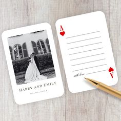 two cards with the same photo on them and a pen sitting next to one that says, harry and family