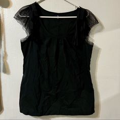 Never Worn And In Good Condition. Lace Short Sleeve With Decorative Lace & Fabric Shoulders. Offer Is Always Accepted. Gap Black Summer Top, Black Gap Top For Summer, Spring Black Tops By Gap, Lace Short, Black Top, Lace Fabric, Lace Shorts, Gap, Blouses