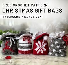 three crochet christmas gift bags sitting on top of a marble counter with text overlay