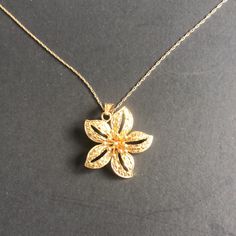 10k Yellow Gold Plumeria Flower Pendant Necklace 18” Formal Gold Jewelry With Flower Decoration, Luxury Flower Pendant Necklace With Flower Charm, Elegant Gold Necklace With Flower Decoration, Elegant Yellow Gold Flower Pendant Necklace, Luxury Flower Shaped Necklace, Luxury Necklace With Flower Charm And Pendant, Gold Flower Necklace With Floral Decoration, Gold Flower Necklaces With Flower Decoration, Gold Hallmarked Flower-shaped Jewelry