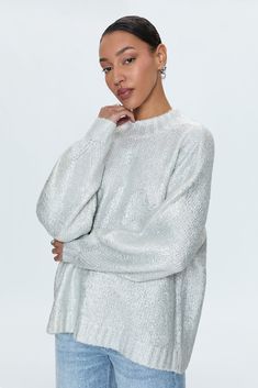 Midweight pullover sweater crafted from a cozy wool blend that's soft to the touch. Designed for a lofty, oversized fit with ribbed cuffs, oversized sleeves, and a mock neck collar. Snow Disco is an iridescent silver hue with a seasonal shine. Oversized Sleeves, Oversize Sleeves, Best Swimwear, Loungewear Luxury, Knit Jumpsuit, Jumpsuit Jacket, Neck Collar, Hat Hairstyles, Dress Accessories