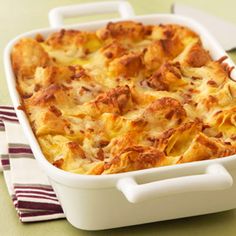 a casserole dish with meat and cheese in it