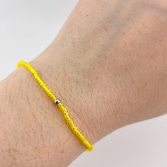 Happy yellow beads are a simple reminder to look for the good in life. Glass seed beads and one 304 stainless steel steel on a stretch cord. Look For The Good, Jewelry Friendship, Happy Yellow, Bracelet Minimalist, Simple Reminders, Seed Bead Bracelet, Bracelet Dainty, Sunshine Yellow, Cute Bracelets