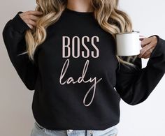 Boss Lady Sweatshirt, Mom Sweatshirt, Christmas Gifts for Mom, Mother hustler life Sweatshirt, Funny Mom Sweatshirt, New Mom Gift, Boss Babe FIT & SIZING: A sturdy and warm unisex sweatshirt bound to keep you warm in the colder months. A pre-shrunk, classic fit sweater that's made with air-jet spun yarn for a soft feel and reduced pilling. * Comfortable and flattering for both men and women. * Please see the size chart in the photos to obtain an accurate size. Measure one of your favorite sweate Boss Christmas Gifts, New Mom Gift, Funny Mom, Sweatshirt Christmas, Favorite Sweater, Valentines Day Shirts, Christmas Gifts For Mom, New Mom