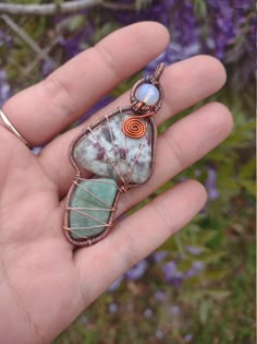 This is a hand wrapped copper and copper colored stainless steel mushroom pendant. This pendant has three different stones; opalite, pink tourmaline and green fuchsite. Can add an adjustable leather cord or a hemp braided necklace with choice of colors and shape for a small additional cost. For hemp necklaces please specify colors (up to 4), braid style (spiral or square) and length. Thank you for supporting my small business! Mushroom Stone, Wire Wrapped Stone Jewelry, Copper Crafts, Mushroom Pendant, Bijoux Fil Aluminium, Hemp Necklace, Wire Wrap Pendant, Braided Necklace, Wire Jewelry Designs