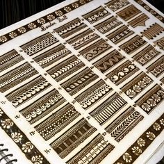 an intricately designed notebook is open on the table