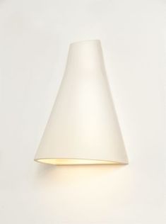 a white wall light on a white wall