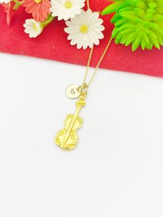 This is a gold -tone Violin Viola charm with hand stamped initial charm on stainless steel or brass chain. ♥ You will receive 1 necklace HOW TO ORDER 1) Select the quantity 2) Select the initial  3) Add to cart DESCRIPTION ♥ Necklaces, Stainless Steel or Brass Cable Chain, Gold Color, with Lobster Claw Clasp, Size: about 17.7 inches (45cm) long, 1-2mm wide, Nickel Safe, ♥ Initial Charms, Stainless-Steel or Brass, Gold Color, Size: about 8-10mm in diameter, 1mm thick, Nickel Safe, ♥ Violin Viola Gold Charm Necklaces Perfect For Gifts, Adjustable Gold Charm Necklace For Gifting, Adjustable Gold Charm Necklace For Gifts, Gold Hand Stamped Charm Necklace For Valentine's Day, Adjustable Gold Charm Necklace As A Gift, Gold Charm Necklace With Hallmark For Personalized Gift, Gold Hand Stamped Necklace For Valentine's Day, Gold Necklace Hand Stamped For Valentine's Day, Hand Stamped Gold Necklace For Valentine's Day