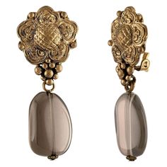 Stephen Dweck Clip-On Earrings Floral Motif with dangle The earrings are brass with smokey quartz dangle The earrings measure 1.75" Long The earrings weigh 15.12 grams Stephen Dweck, Smokey Quartz, Brass Earrings, Floral Motif, Clip On, Clip On Earrings, Jewelry Earrings, Brass, For Sale