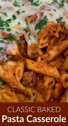 a close up of a plate of pasta casserole with meat and cheese on it