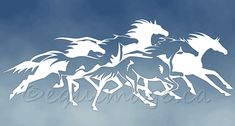 a group of horses running across a blue sky