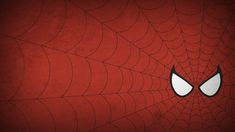 a spider - man wallpaper with white eyes on it's face and web