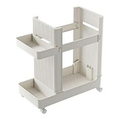 a white plastic shelf with two shelves on wheels